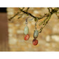 Handmade, natural Amazonite gemstone earrings, made with 2 different coloured 9.6mm tumble stones hanging from a small apple tree branch, west cork.